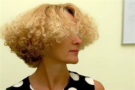 There was an upside-down triangle of curls on the top of my head. . Perm stories